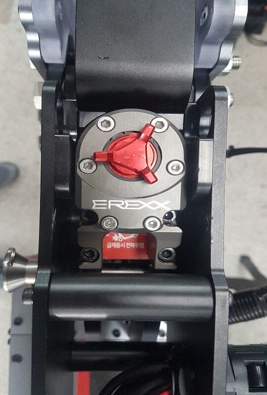 erexx adjustable steering damper installed in currus electric scooter